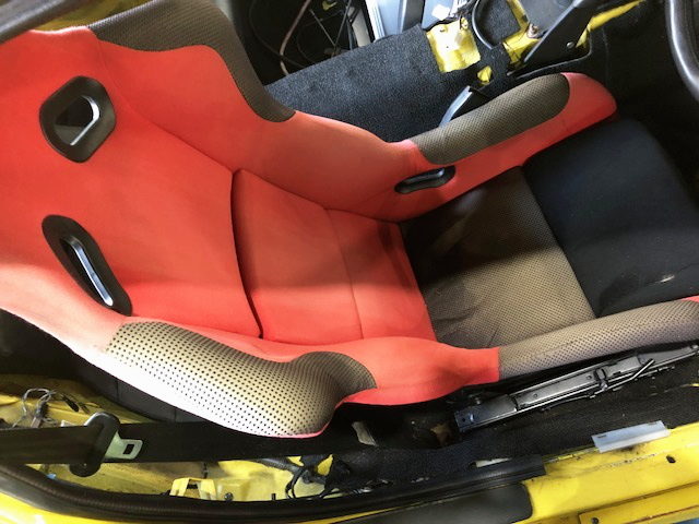 FULL BUCKET SEAT TO DRIVER