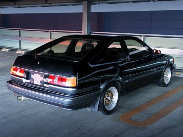 REAR EXTERIOR OF AE86 LEVIN GT-APEX BLACK and SILVER TWO-TONE.