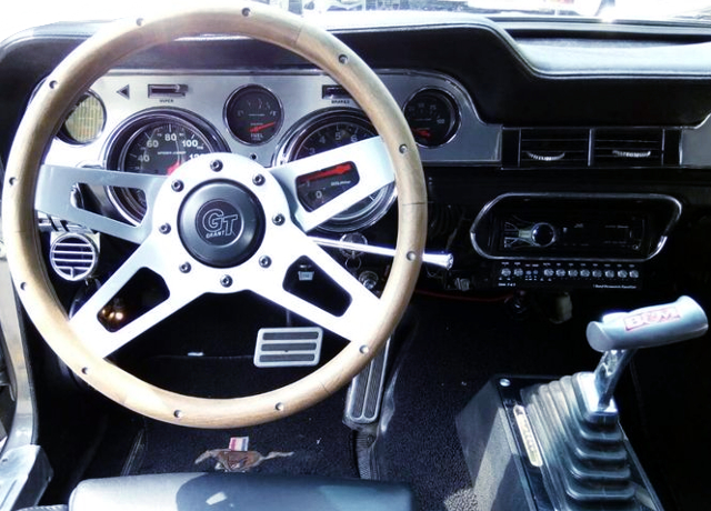 DRIVER'S DASHBOARD OF 1st Gen Ford Mustang Fastback.