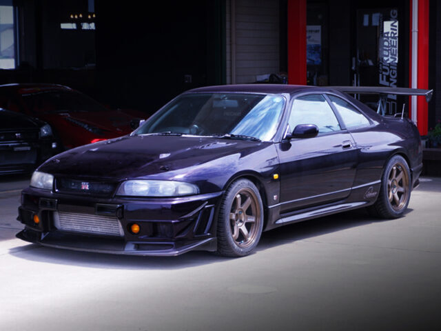 FRONT EXTERIOR OF R33 GT-R V-SPEC MIDNIGHT PURPLE.