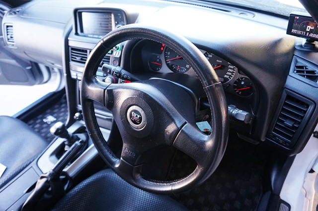 DRIVER'S STEERING AND DASHBOARD.