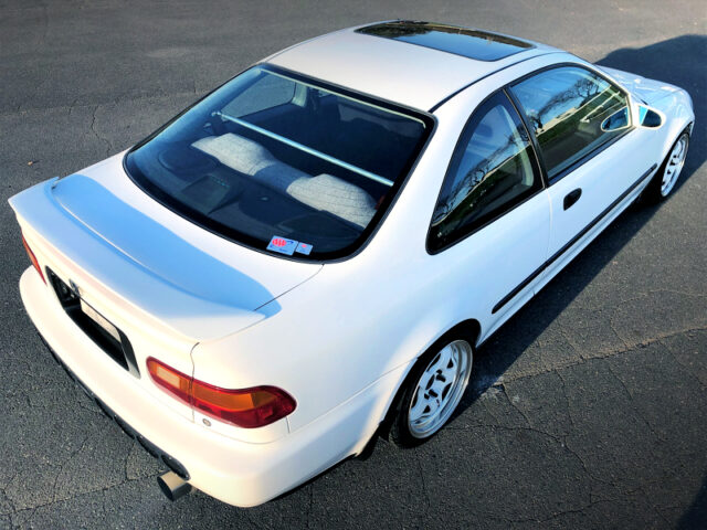 REAR EXTERIOR of WHITE EJ1 CIVIC COUPE.