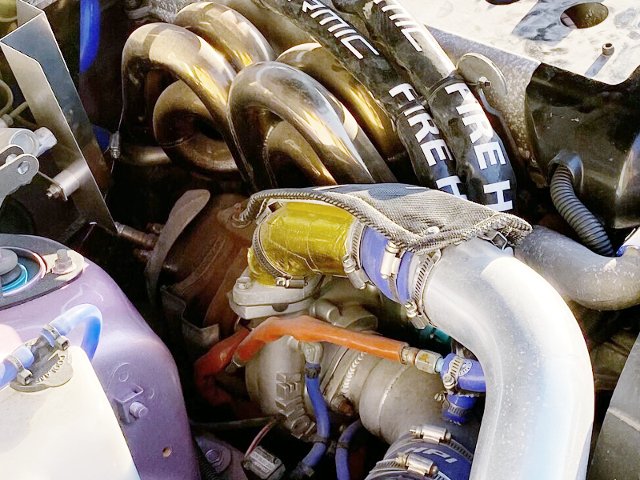 TOMEI TURBINE and AFTERMARKET EXHAUST MANIFOLD on 1JZ-GTE.