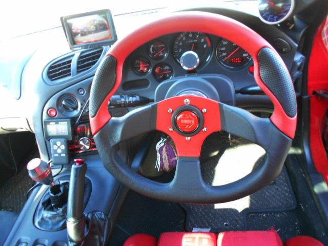 DRIVER'S SIDE DASHBOARD and MOMO STEERING.
