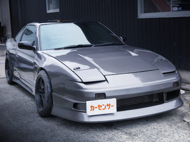 FRONT EXTERIOR of GUN METALLIC PAINT and WIDEBODIED 180SX.