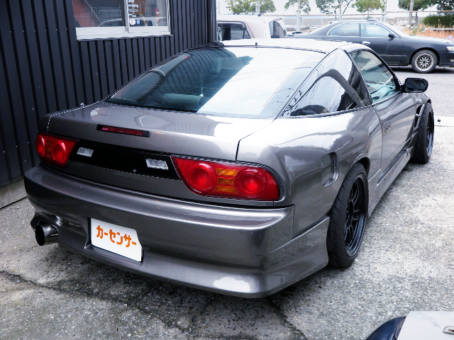REAR EXTERIOR of GUN METALLIC PAINT and WIDEBODIED 180SX.