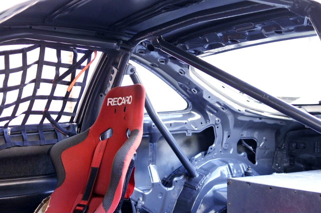 ROLL CAGE and RECARO SEAT.