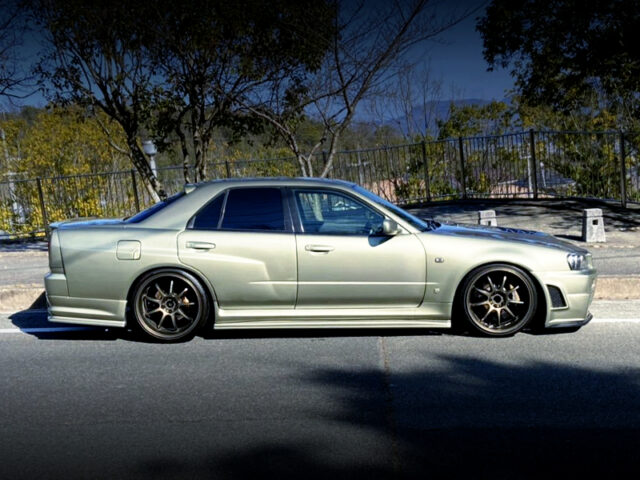 RIGHT-SIDE EXTERIOR of GT-R STYLE WIDEBODIED HR34 SEDAN.