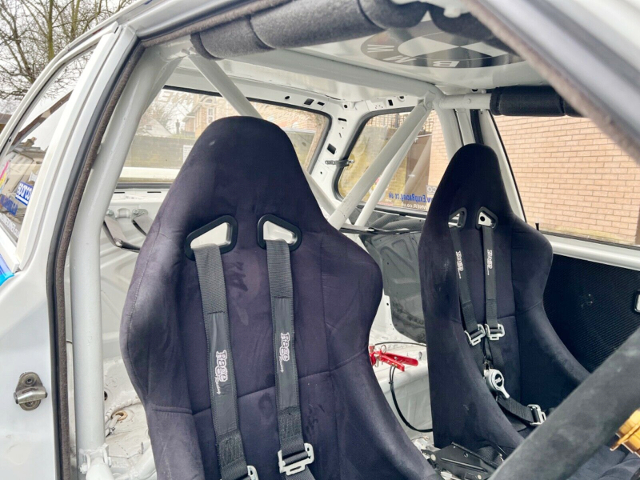 FULL BUCKET SEATS and ROLL CAGE.