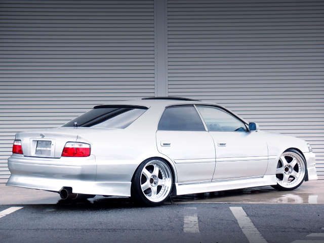 REAR RIGHT SIDE EXTERIOR of SILVER JZX100 CHASER TOURER-V.