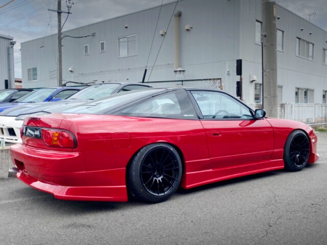 REAR EXTERIOR of RED 180SX.