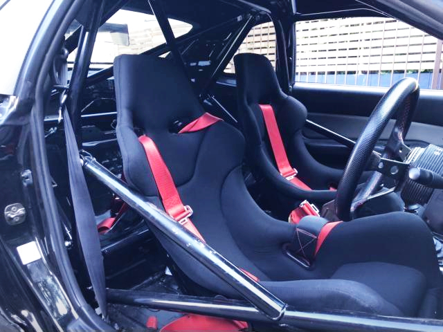FULL BUCKET SEAT and ROLL CAGE.