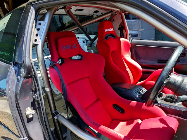ROLL CAGE and BUCKET SEATS.