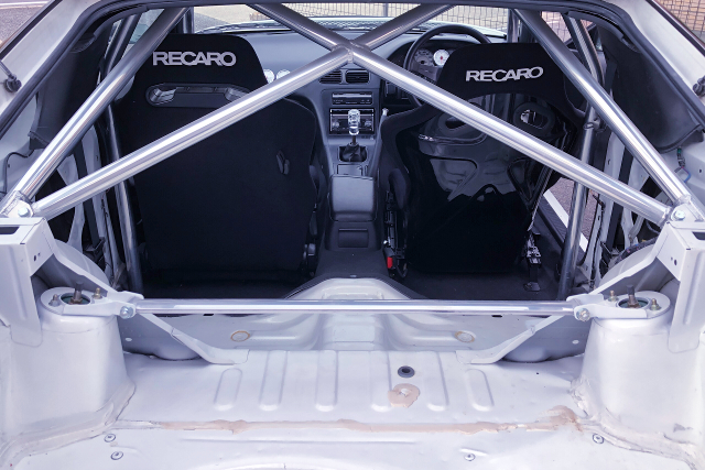 ROLL CAGE and RECARO SEATS.