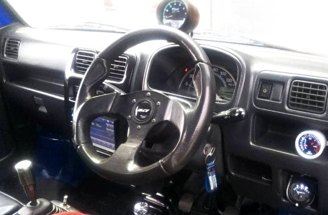 DASHBOARD and STEERING of BLUE DA63T CARRY TRUCK.