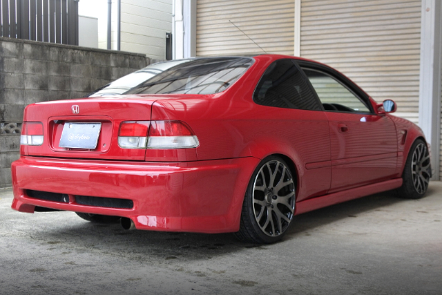 REAR EXTERIOR of RED EJ7 CIVIC COUPE.