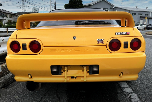 REAR EXTERIOR of YELLOW R32 GT-R.