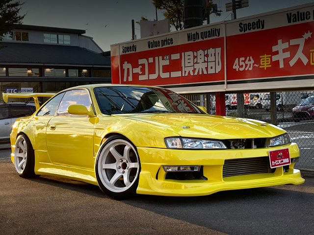 FRONT EXTERIOR of LATE MODEL YELLOW WIDEBODY S14 SILVIA.