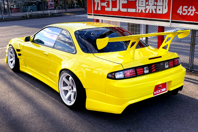 REAR EXTERIOR of LATE MODEL YELLOW WIDEBODY S14 SILVIA.