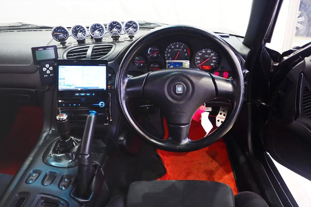 DRIVER SIDE DASHBOARD of BLACK FD3S RX-7 TYPE-RS.