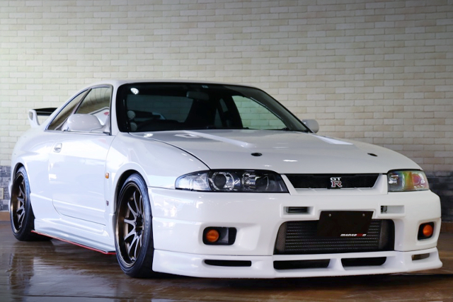 FRONT EXTERIOR of WHITE R33 GT-R.