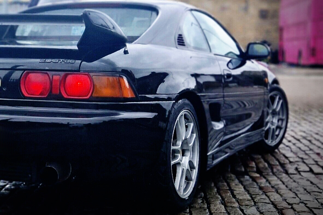 REAR RIGHT-SIDE EXTERIOR of BLACK SW20 MR2.