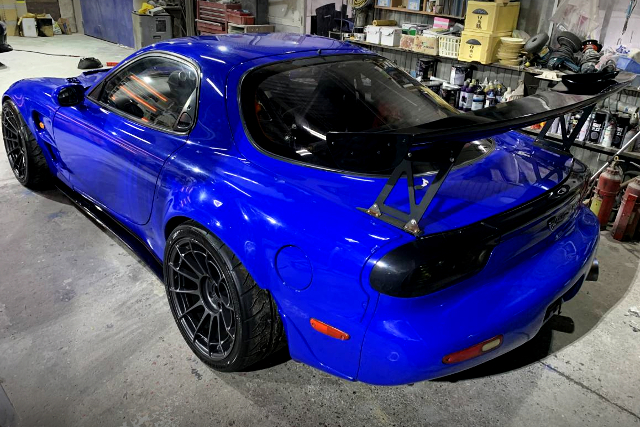 REAR EXTERIOR of BLUE WIDEBODY FD3S RX-7.