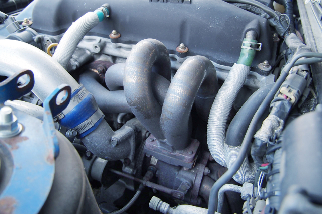 EXHAUST MANIFOLD and TOMEI TURBINE on SR20DET ENGINE.