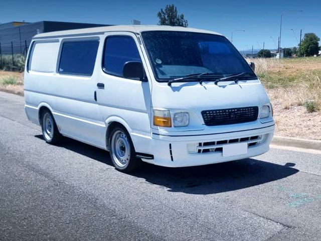 FRONT EXTERIOR of WHITE H100 HIACE VAN.