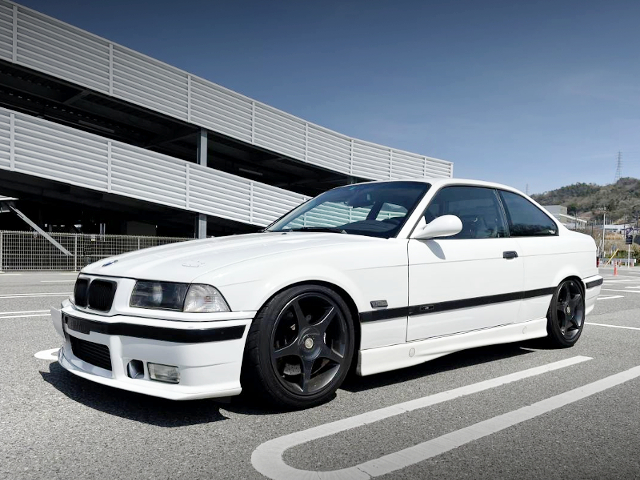 FRONT LEFT-SIDE EXTERIOR of E36 BMW 318is COUPE.