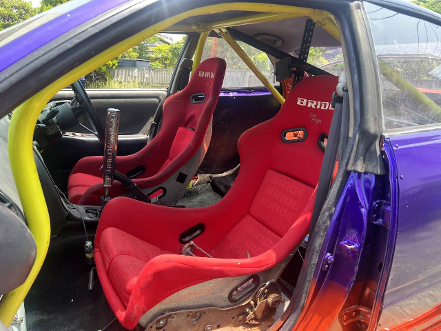 ROLL CAGE and BRIDE SEATS.