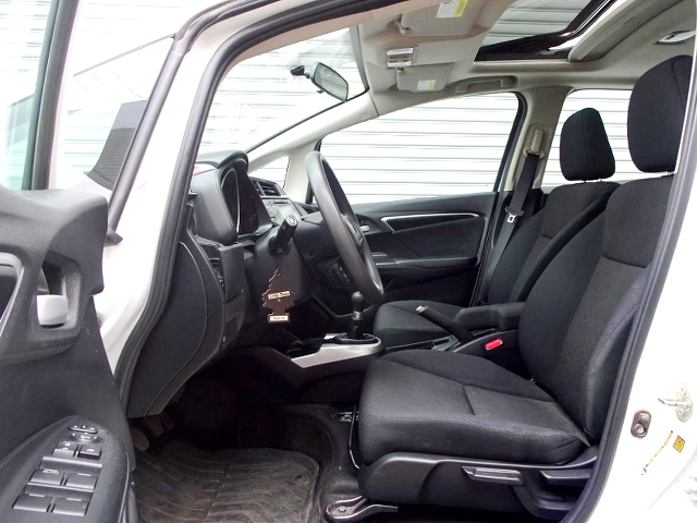 Driver side interior of GK5 Fit.