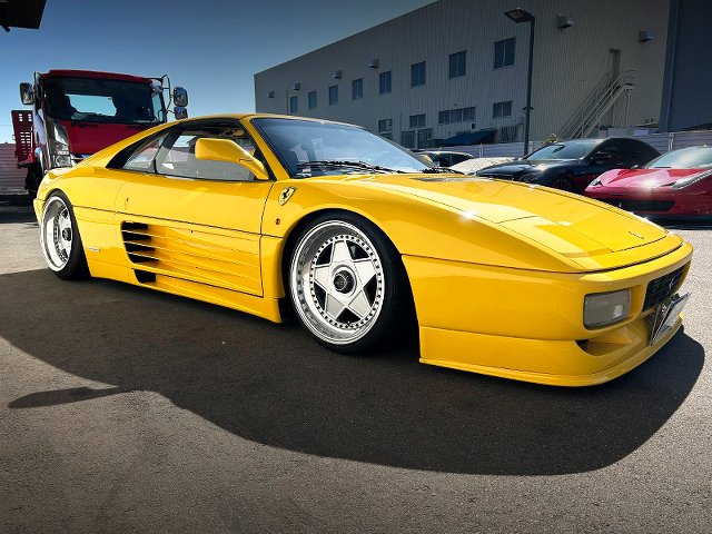 Front right-side exterior of Bagged FERRARI 348ts.