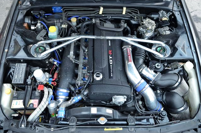 RB26 2.8L stroker and GT-SS twin turbo.