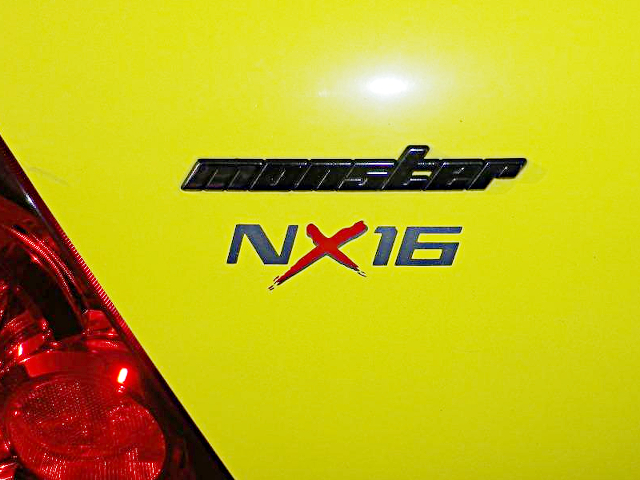 MONSTER emblem and NX16 logo sticker.