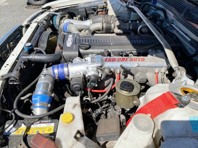 1JZ-GTE twin turbo engine.