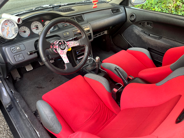 Left-hand drive interior of nardo gray EJ1 CIVIC COUPE.