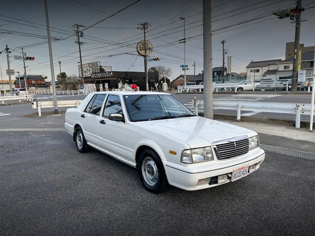 Front exterior of Japanese masked police car replica YPY31 GLORIA SEDAN.