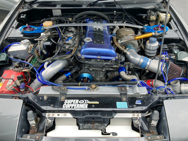 SR20DET 2.2L stroker engine with top mount turbo.