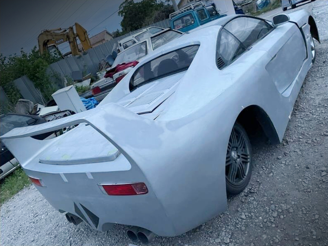 Rear-side exterior of TOYOTA SW20 MR2 G T-BAR ROOF with supercar style.