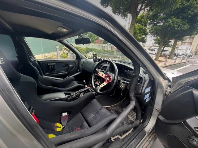 Dashboard and roll cage of WIDEBODY R33 SKYLINE 4-door.