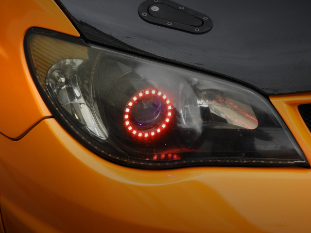 Aftermarket Hawkeye headlight.