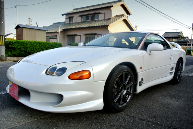 Front exterior of God's Mitsubishi GTO.