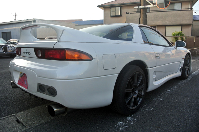 Rear exterior of God's Mitsubishi GTO.