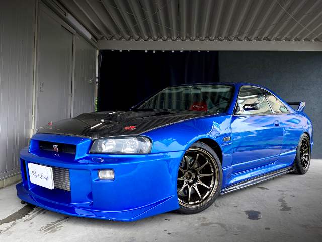 Front exterior of R34 faced R33 SKYLINE GT-R.