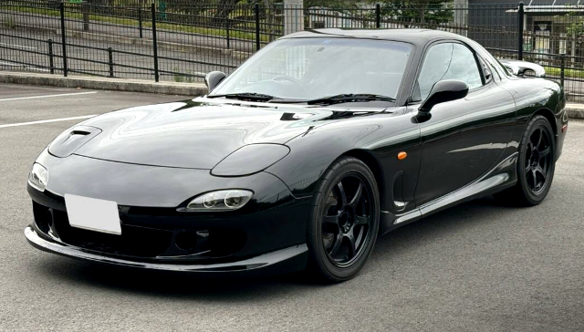 Front exterior of Black FD3S RX-7.