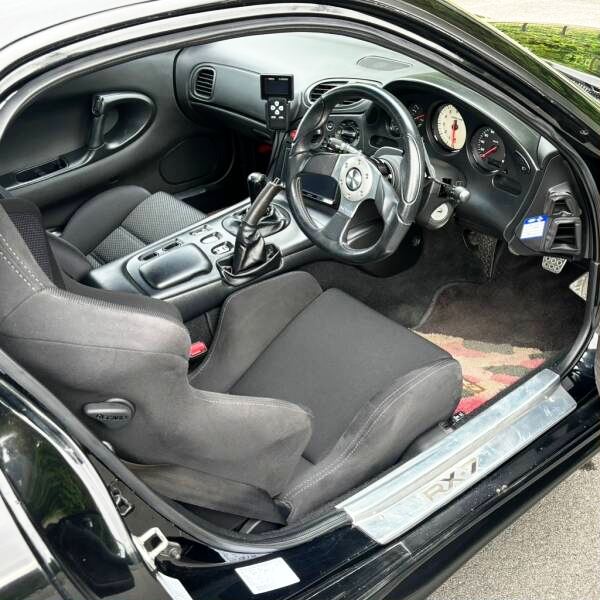 Interior of Black FD3S RX-7.