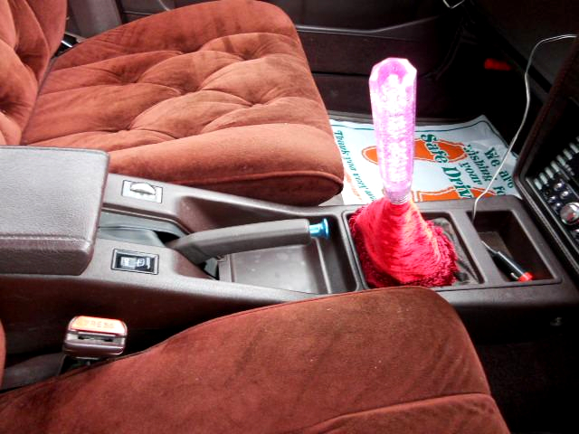 manual shift knob and emergency brake.