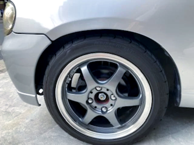 Aftermarket rim.