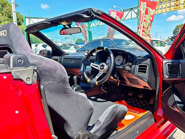 Driver side interior of WIDEBODY FC3C RX-7 Cabriolet.